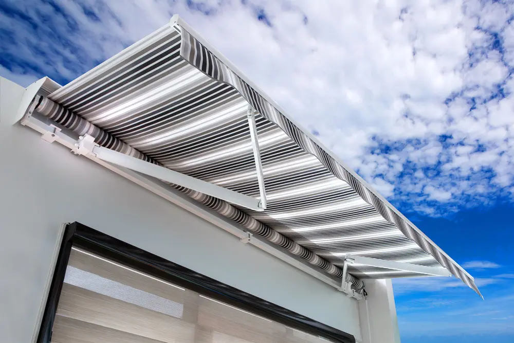 Toldo con brazo extensible y tela de alta calidad